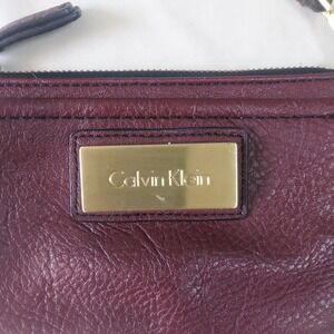 Calvin Klein Burgundy Pebbled Faux Leather Wristlet Gold Hardware Bag